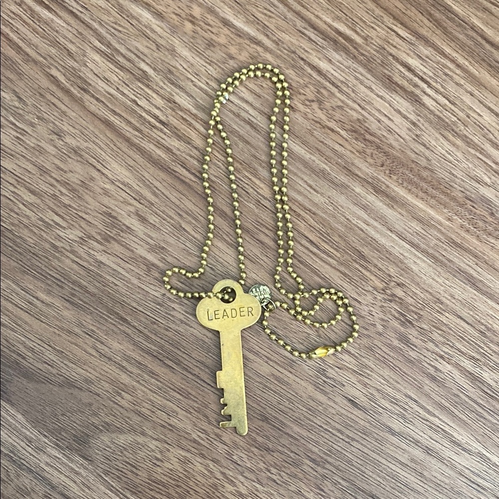 Gold Key Necklace with 'Leader' Inscription